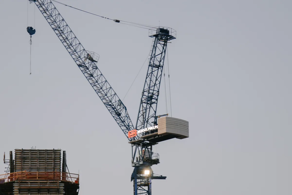 Commercial complex structural construction and crane activity